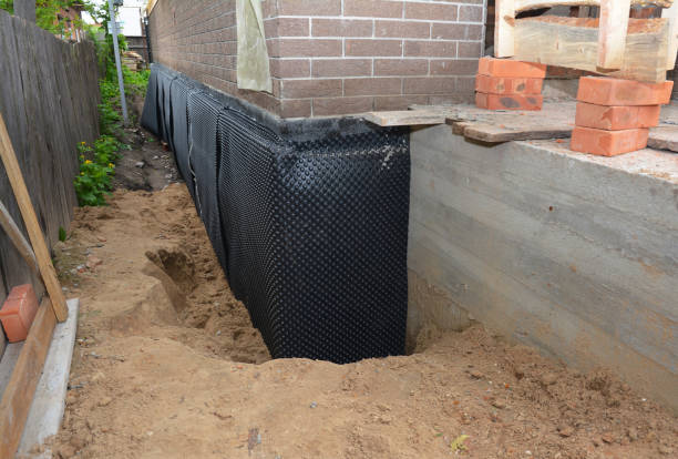 Happy homeowners after waterproofing job in Watervliet